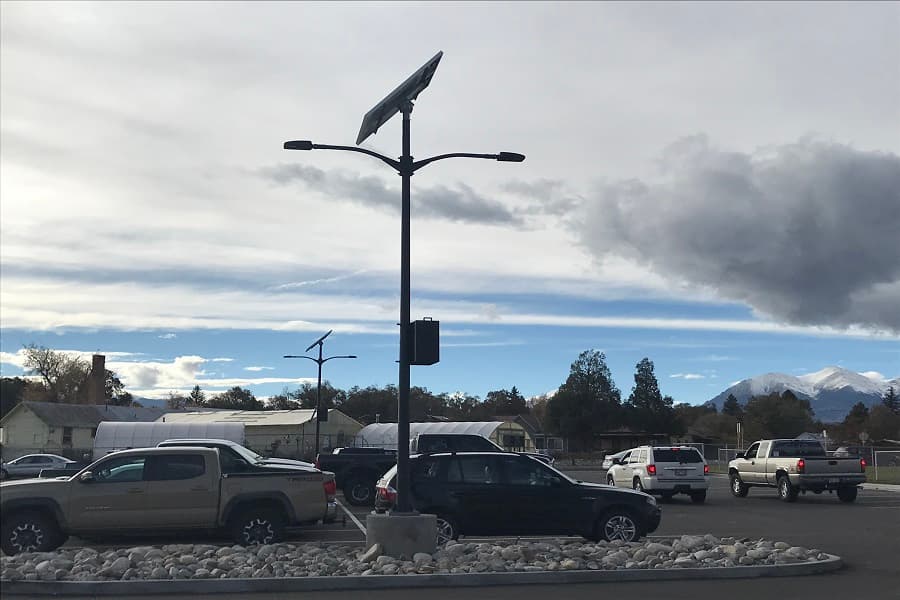 Solar street light installation serving a public roadway