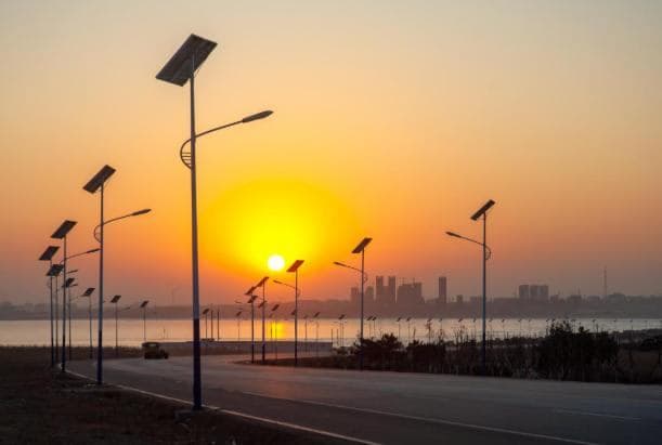 Solar-powered street light along a Nevada roadway at dusk